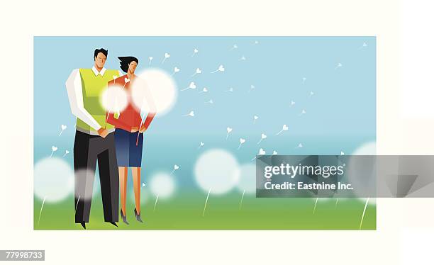 man and a woman standing in a field and holding plants - landing touching down stock illustrations