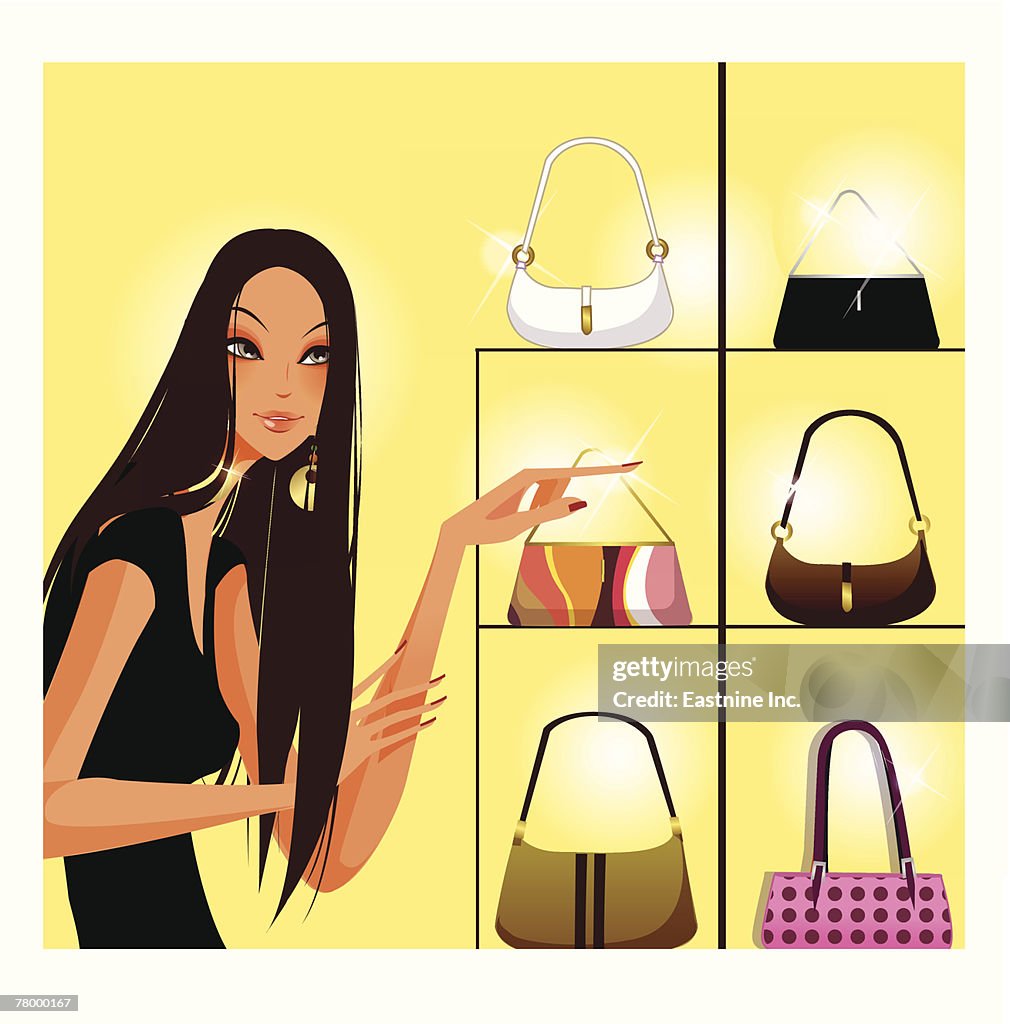 Woman pointing towards a purse