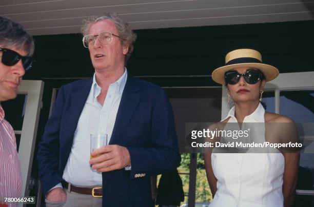 British actor Michael Caine with his wife, Shakira, at the first match to be played at John Paul Getty Jr's new cricket ground on his Wormsley Park...
