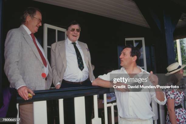 American-born British philanthropist Sir Paul Getty talking to former English cricketer Richard Hutton at the first match to be played at Getty's new...