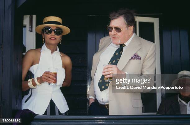 Shakira Caine and American-born British philanthropist Sir Paul Getty at the first match to be played at Getty's new cricket ground on his Wormsley...