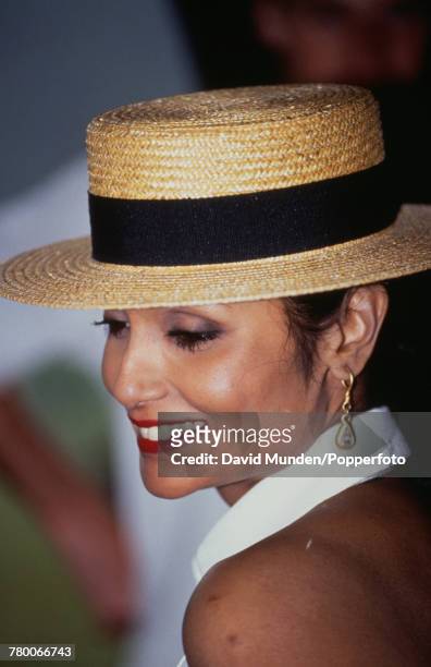Shakira Caine, wife of British actor Michael Caine, at the first match to be played at John Paul Getty Jr's new cricket ground on his Wormsley Park...
