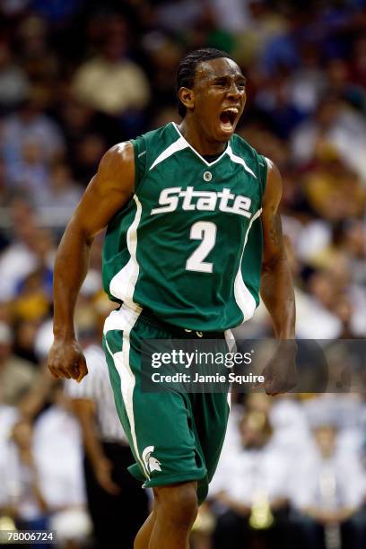 Raymar Morgan of the Michigan State Spartans reacts after sinking a three-pointer during the O'Reilly Auto Parts CBE Classic semifinal game against...