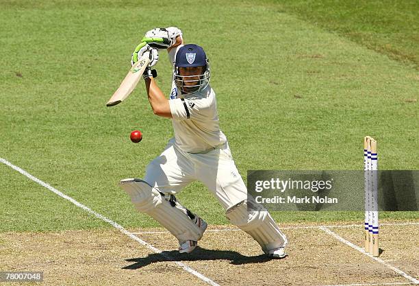 Phillip Hughes of NSW in action during day one of the Pura Cup match between the New South Wales Blues and the Tasmanian Tigers at the Sydney Cricket...