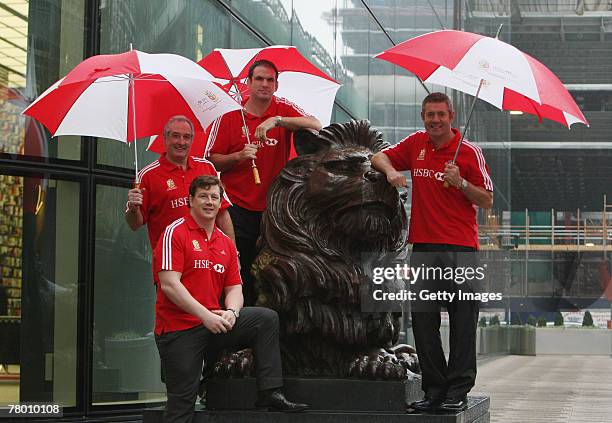 Former Lions players Gareth Edwards, Paul Wallace, Martin Johnson and Gavin Hastings pose following the press conference to announce HSBC as...