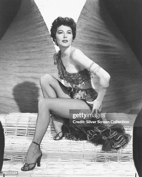 American actress Ava Gardner , in an exotic two-piece outfit, circa 1950.