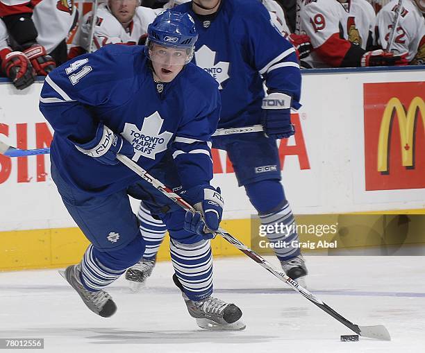Jiri Tlusty of the Toronto Maple Leafs carries the puck up ice during game action against the Ottawa Senators November 17, 2007 at the Air Canada...