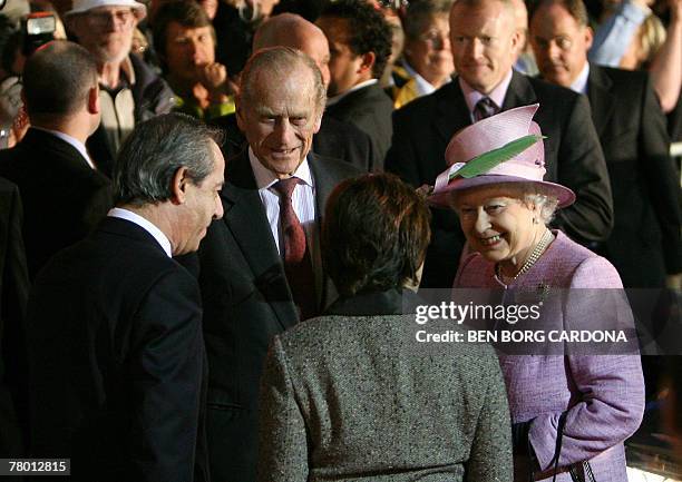 Malta's Prime Minister Lawrence Gonzi and his wife Kate receive Queen Elizabeth II and her husband the Duke of Edinburgh in Valletta 20 November...