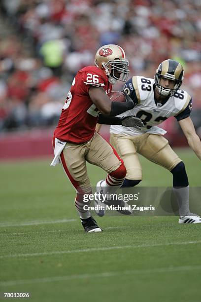 Mark Roman of the San Francisco 49ers runs with the ball during the NFL game against the St. Louis Rams at Monster Park on November 18, 2007 in San...