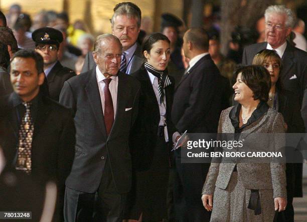 The Duke of Edinburgh walks with Malta's Prime Minister's wife Kate Gonzi 20 November 2007 during a visit to Valletta. The Queen and the Duke of...
