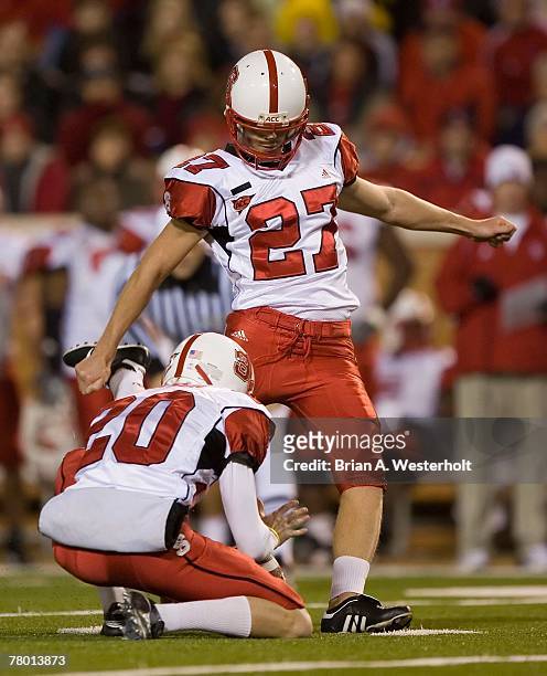 Steven Houschka of the North Carolina State Wolfpack attempts a field goal versus the Wake Forest Demon Deacons at BB&T Field November 17, 2007 in...