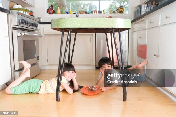 Under Table 266 Kids Playing Under Table Stock Photos, High-Res Pictures, and ...