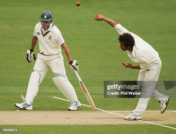 Andre Adams of Auckland bowls past Peter Ingram of Central during day three of the State Championship cricket match between the Auckland Aces and the...