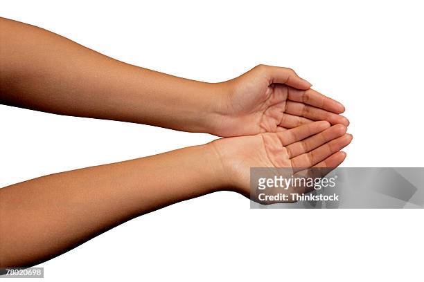 woman's arms extended with cupped hands - hands cupped empty ストックフォトと画像