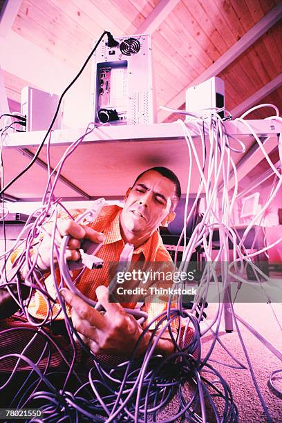 Strangling Ups Computer 121 Untangling Wires Stock Photos, High-Res Pictures, and Images ...
