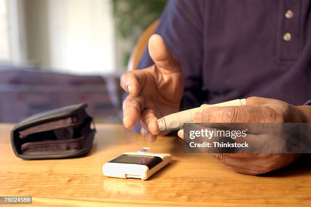 hands drawing blood for glucose test - image effect stock pictures, royalty-free photos & images