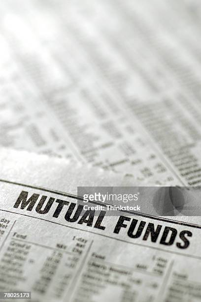 financial section of newspaper - mutual fund stock pictures, royalty-free photos & images