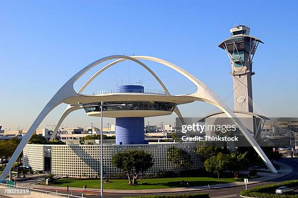 the tower and main entrance to lax airport in los angeles, california. - lax airport stock pictures, royalty-free photos & images