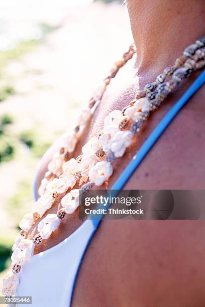 Shell Ribbon Lei 209 Shell Lei Stock Photos, High-Res Pictures, and Images - Getty Images