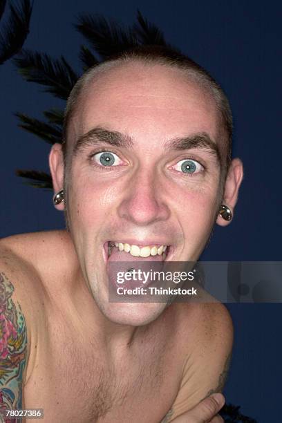 thc0017769 - tongue stud stock pictures, royalty-free photos & images