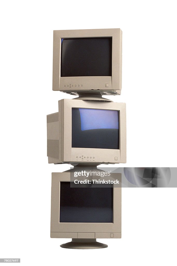 Stack Of Computer Monitors Against White Background High-Res Stock ...