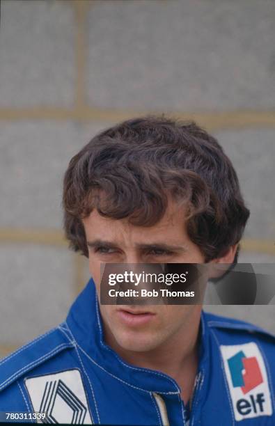 French racing driver Alain Prost, driver of the Equipe Renault Elf Renault RE30 Renault V6t, pictured during the 1981 British Grand Prix at...