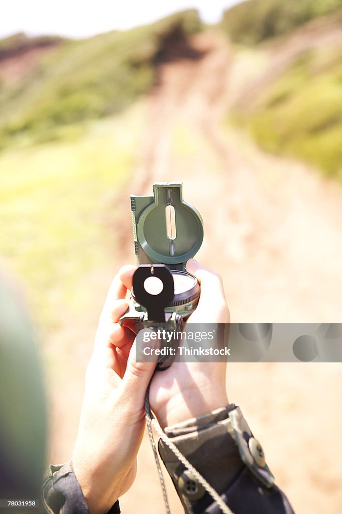 Compass Scope A Soldier Holding And Looking Through A Compass Scope High-Res Stock ...