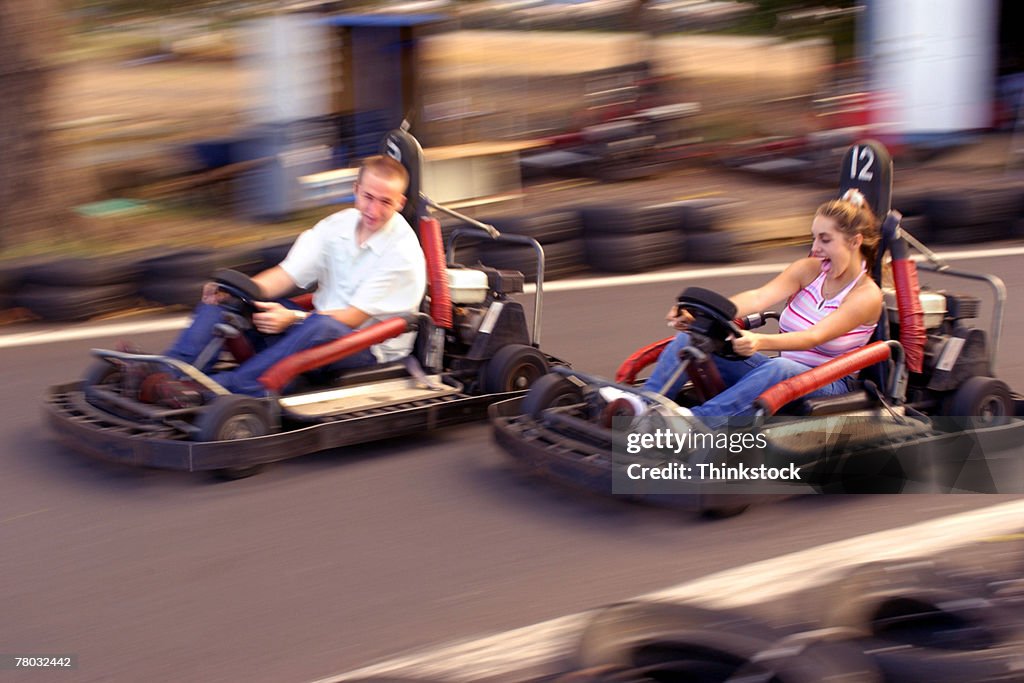 Teenagers in go carts
