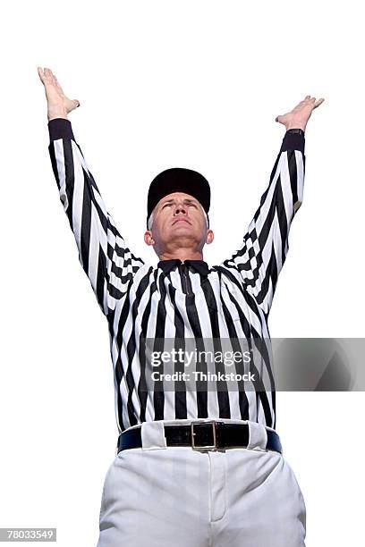 low angle of referee signaling a touchdown. - football schiedsrichter stock-fotos und bilder