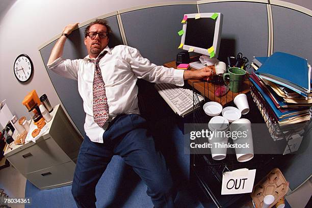 businessman at messy desk - fish eye lens stock pictures, royalty-free photos & images