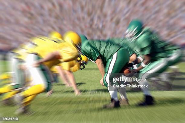 football game - defensive lineman american football player stock pictures, royalty-free photos & images