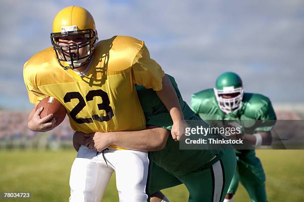 football game - high school football stock pictures, royalty-free photos & images