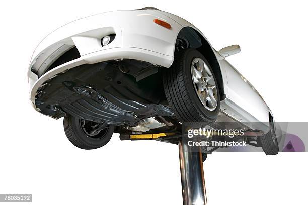 car on lift - car underside stock pictures, royalty-free photos & images