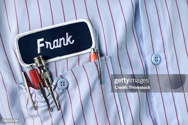 name patch over mechanic's front pocket - name patch stock pictures, royalty-free photos & images