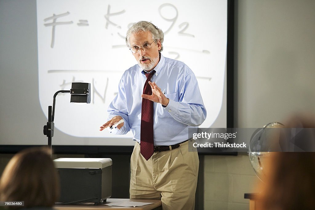 Teacher with overhead projector