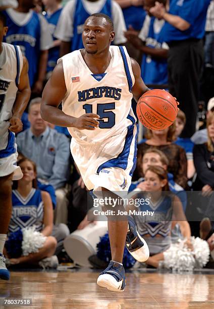 Andre Allen of the Memphis Tigers brings the ball upcourt against the Arkansas State Indians at FedExForum on November 20, 2007 in Memphis,...