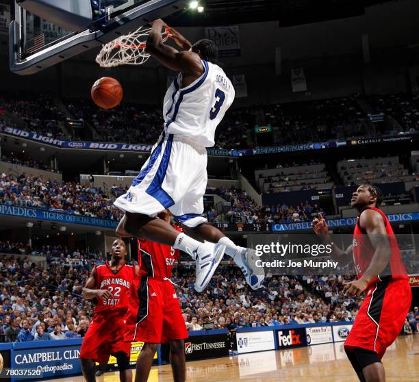 Joey Dorsey of the Memphis Tigers dunks the ball against the Arkansas State Indians at FedExForum on November 20, 2007 in Memphis, Tennessee. The...