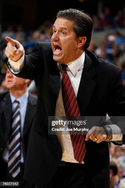 John Calipari, head coach of the Memphis Tigers gives instructions from the sideline against the Arkansas State Indians at FedExForum on November 20,...