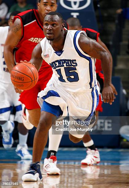 Andre Allen of the Memphis Tigers brings the ball upcourt against the Arkansas State Indians at FedExForum on November 20, 2007 in Memphis,...