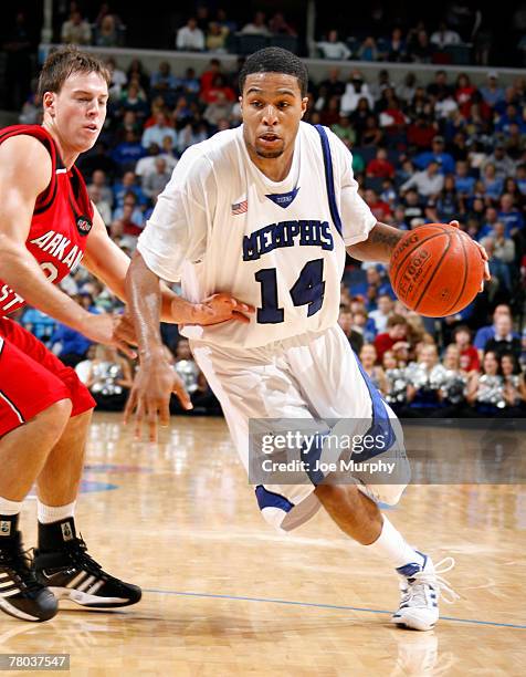 Chris Douglas-Roberts of the Memphis Tigers drives against the Arkansas State Indians at FedExForum on November 20, 2007 in Memphis, Tennessee. The...