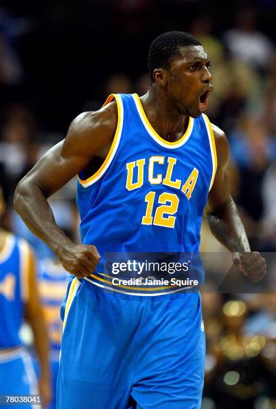 Alfred Aboya of the UCLA Bruinsreacts after making a shot during the
