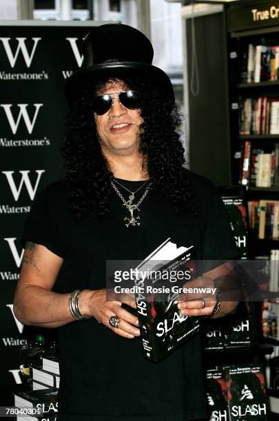 Guns 'N' Roses former lead guitarist Saul "Slash" Hudson signs copies of his autobiography 'Slash' at Waterstones Piccadilly on November 21, 2007 in...