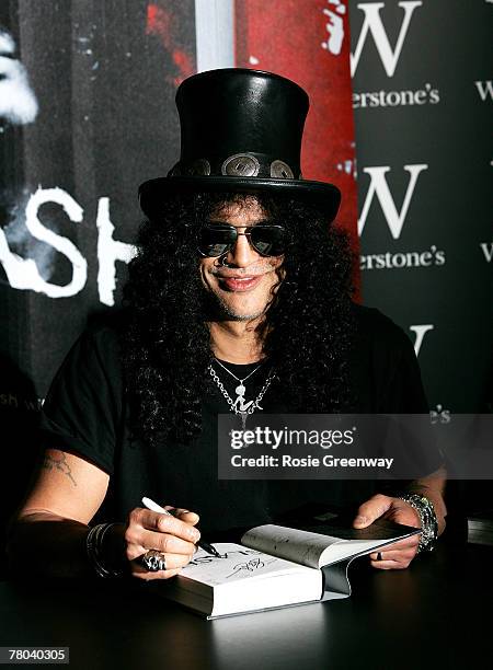 Guns 'N' Roses former lead guitarist Saul "Slash" Hudson signs copies of his autobiography 'Slash' at Waterstones Piccadilly on November 21, 2007 in...