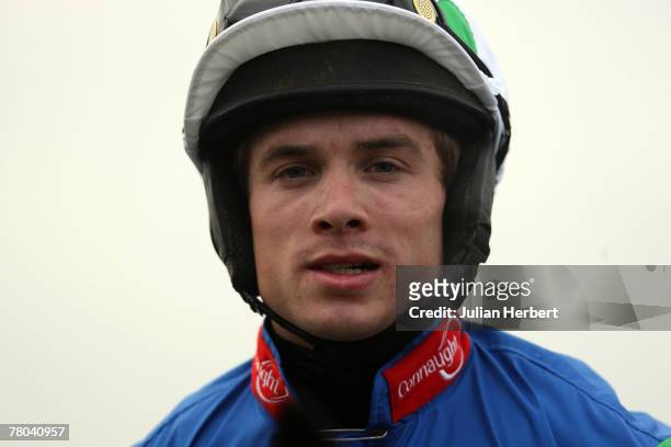 Sam Thomas, who is due to ride kauto Star on Saturday, looks on at Warwick Racecourse on November 21 in Warwick, England.