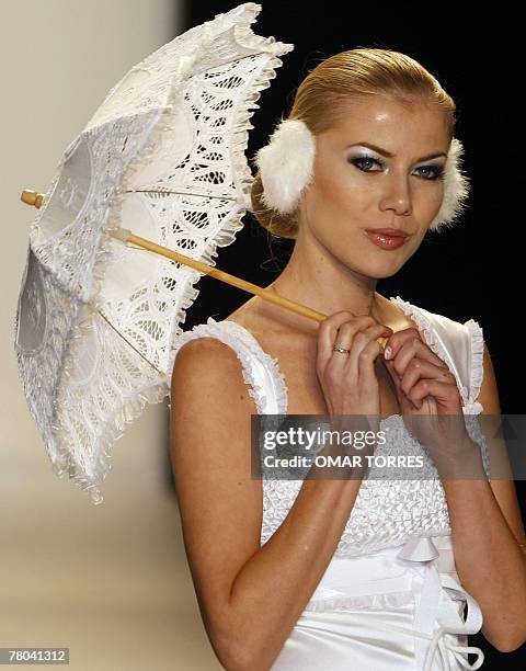 Model displays a creation by Peruvian designer Claudia Jimenez during the first day of Fashionweek in Mexico City 23 October, 2007. AFP PHOTO/Omar...