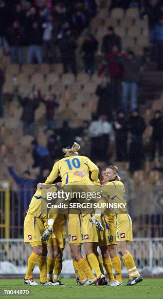 Players of Ukraine national soccer team react after scoring during the Euro 2008 qualifying football match Ukraine vs. France. France is already...