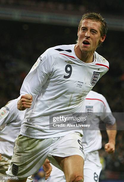 Peter Crouch of England celebrates after scoring England's 2nd and the equalising goal during the Euro 2008 Group E qualifying match between England...
