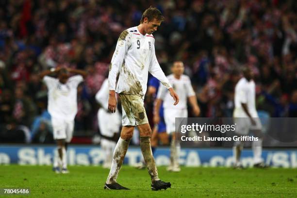 Peter Crouch of England looks dejected following Croatia's third goal the Euro 2008 Group E qualifying match between England and Croatia at Wembley...