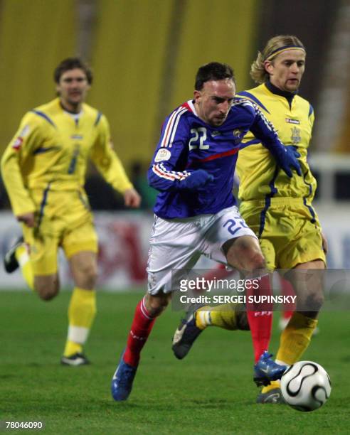 Ukraine's Anatoliy Tymoshchuk fights for a ball with France's Franck Ribery during their Euro 2008 qualifying football match Ukraine vs. France....