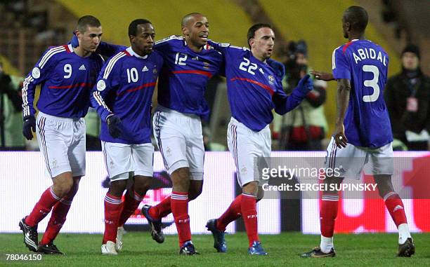 Players of France's national team react after they scored during their Euro 2008 qualifying football match Ukraine vs. France, 21 November 2007 at...